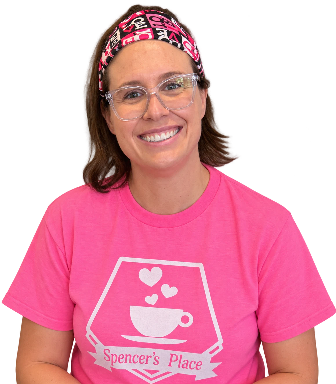 A smiling Treasure House resident in a Spencer’s Place t-shirt